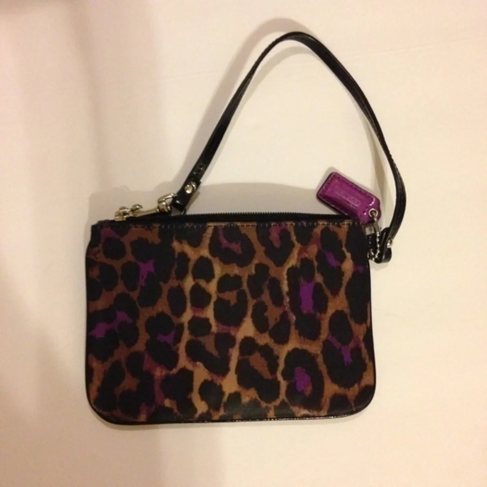 Coach rare ocelot wristlet purple animal print